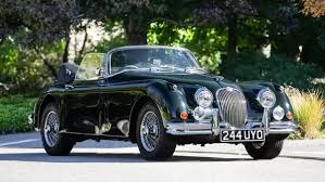 Image result for Dark Green 1959 Jaguar