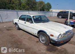 Image result for Nimbus White 1987 Jaguar