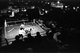 A view from the upper stands as fans watch Mariano Marquez put down Patrick Cann during Fight Night on April 29, 1997 at the Blue Horizon in Philadelphia, ... - Boxing-28-2