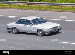 Image result for Nimbus White 1987 Jaguar
