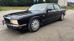 Image result for Black Cherry 1991 Jaguar