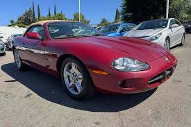 Image result for Phoenix Red 1999 Jaguar