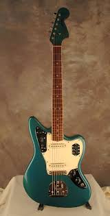 Image result for Turquoise 1973 Jaguar