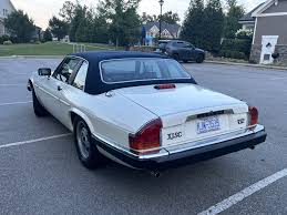 Image result for Glacier White 1988 Jaguar