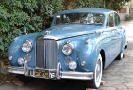 Image result for Silver Blue 1959 Jaguar