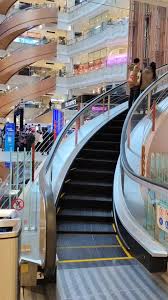 Image result for spiral escalator