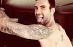 Adam Levine for OUT September