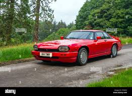 Image result for Sebring Red 1986 Jaguar