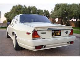 Image result for Nimbus White 1987 Jaguar