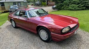 Image result for Grenadier Red 1987 Jaguar