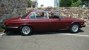 Image result for Sebring Red 1986 Jaguar