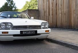 Image result for Glacier White 1988 Jaguar
