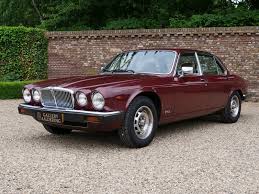 Image result for Burgundy 1983 Jaguar