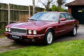Image result for Carnival Red 1996 Jaguar