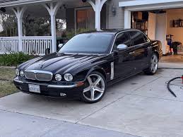 Image result for Black Cherry 2006 Jaguar