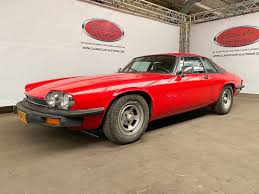 Image result for Sebring Red 1986 Jaguar