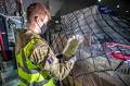 File:No. 1 Air Mobility Wing Preparing COVID-19 Vaccines for ...