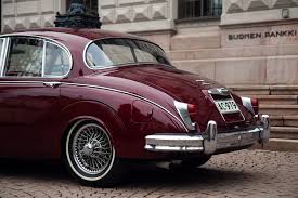 Image result for Burgundy 1983 Jaguar