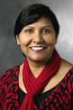 Photograph of Susan Singh with a Red Scarf and a red blouse - susan_singhpicture