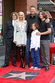 Image result for Queen B by Bumbleride $428 Gwen Stefani and Gavin Rossdale with Kingston and Zuma at the LA zoo