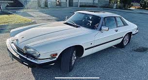 Image result for Nimbus White 1987 Jaguar