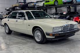 Image result for New Glacier White 1991 Jaguar
