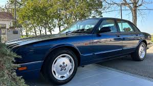 Image result for Antigua Blue 1997 Jaguar