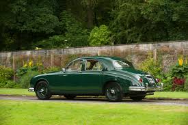 Image result for Dark Green 1959 Jaguar
