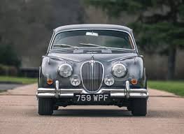 Image result for Dark Green 1959 Jaguar