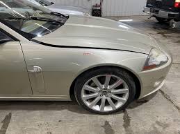 Image result for Winter Gold Pearl 2007 Jaguar