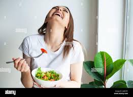 Image result for women eating salad and smiling