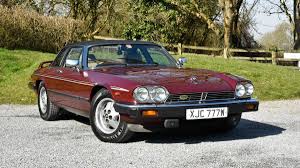 Image result for Sebring Red 1986 Jaguar
