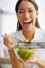 Image result for women eating salad and smiling