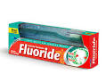 using fluoride toothpaste