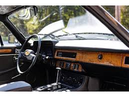 Image result for Tudor White 1982 Jaguar