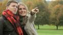 Happy smiling Caucasian couple enjoying a cold Autumn day in the