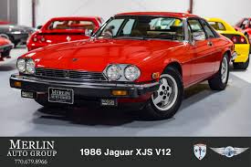 Image result for Sebring Red 1986 Jaguar