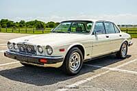 Image result for Nimbus White 1987 Jaguar