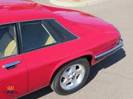 Image result for Sebring Red 1986 Jaguar