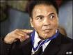 Muhammad Ali gestures to President Bush at the White House medal ceremony - images?q=tbn:ANd9GcS5ubDXlWjL3ejiHawJmNs15T8qHPrxXXoJB6asVQLnR5N_-Mau-lG6vdA