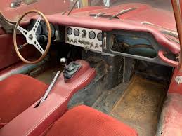 Image result for Maroon 1962 Jaguar