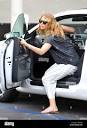 Jennifer Lawrence gets out of her car to go to an ATM in Santa ...