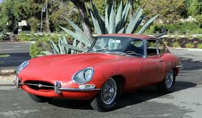 Image result for Carmen Red 1961 Jaguar