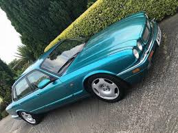 Image result for Bright Turquoise 1995 Jaguar