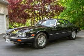 Image result for Black Cherry 1991 Jaguar