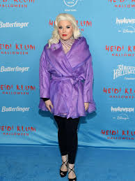 Image result for Easywalker QTRO with Carrycot Seal and Heidi Klum