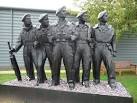 A memorial statuary that commemorates the bravery, cameraderie and short - via Daymix