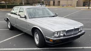 Image result for Glacier White 1988 Jaguar