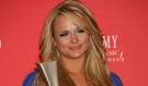 http://blog.zap2it.com/pop2it/miranda_lambert.jpg