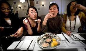 4 Women, Discussing Oysters and Men. Katie Orlinsky for The New York Times. THE FRESHMEN From left, Raiquel Cole, Jane Gu, Erin Seo and Shanika Strings. - 21table_ready-articleLarge